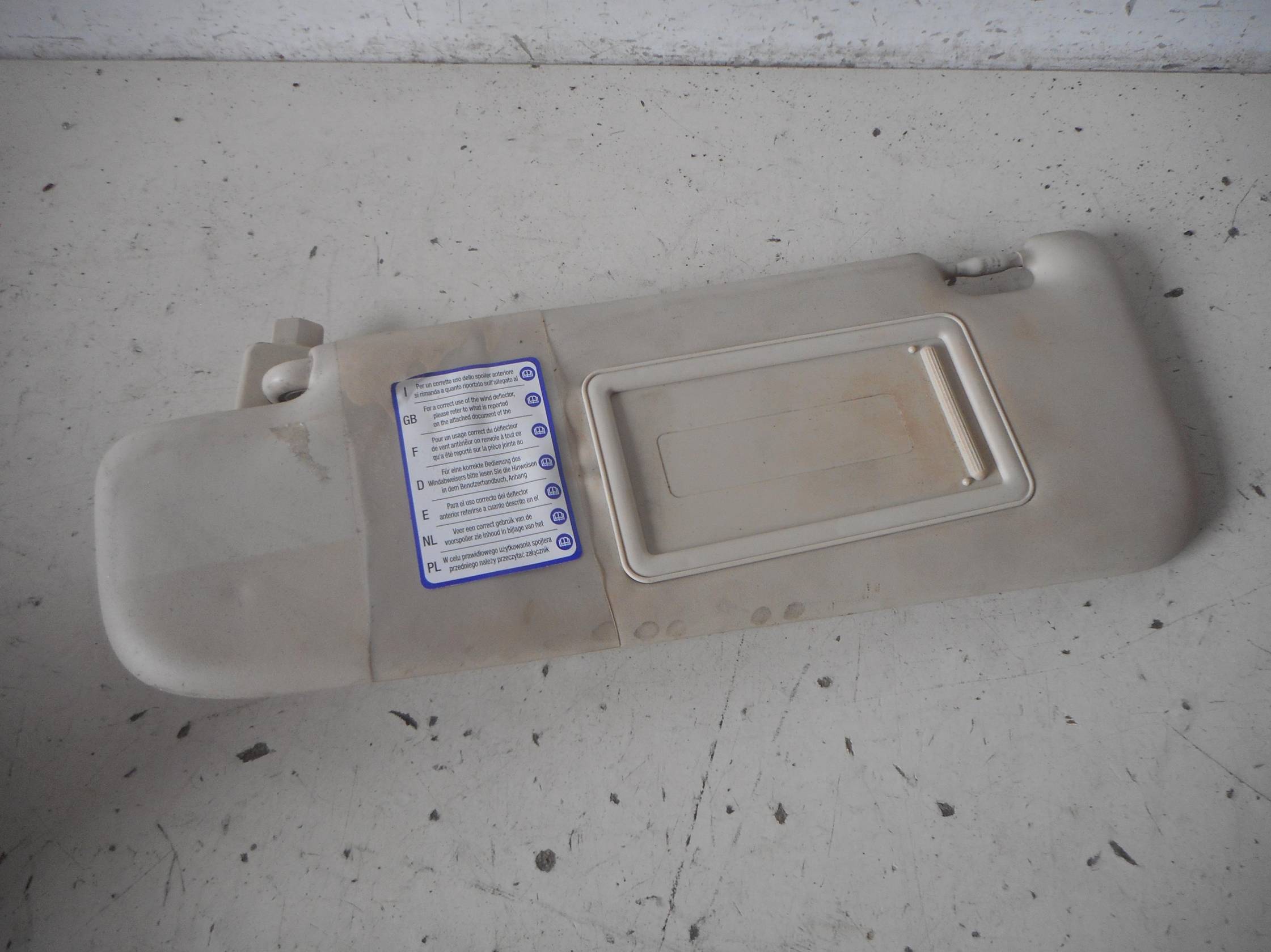 Aletta parasole parabrezza sx.